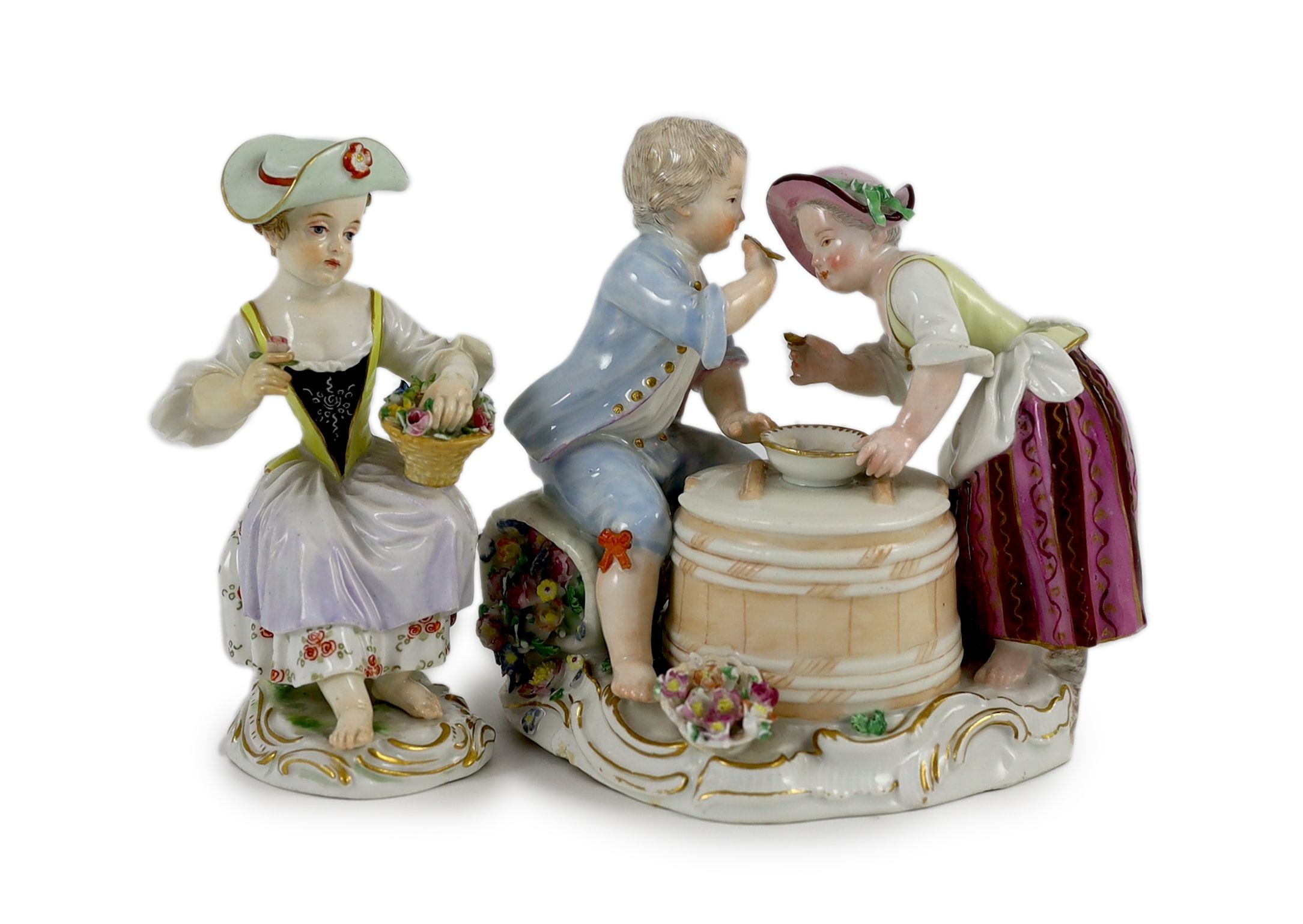 A Meissen group of two children eating from a bowl, dot period and a Meissen figure of a flower girl, early 20th century 12 and 12.5 cm high (2)